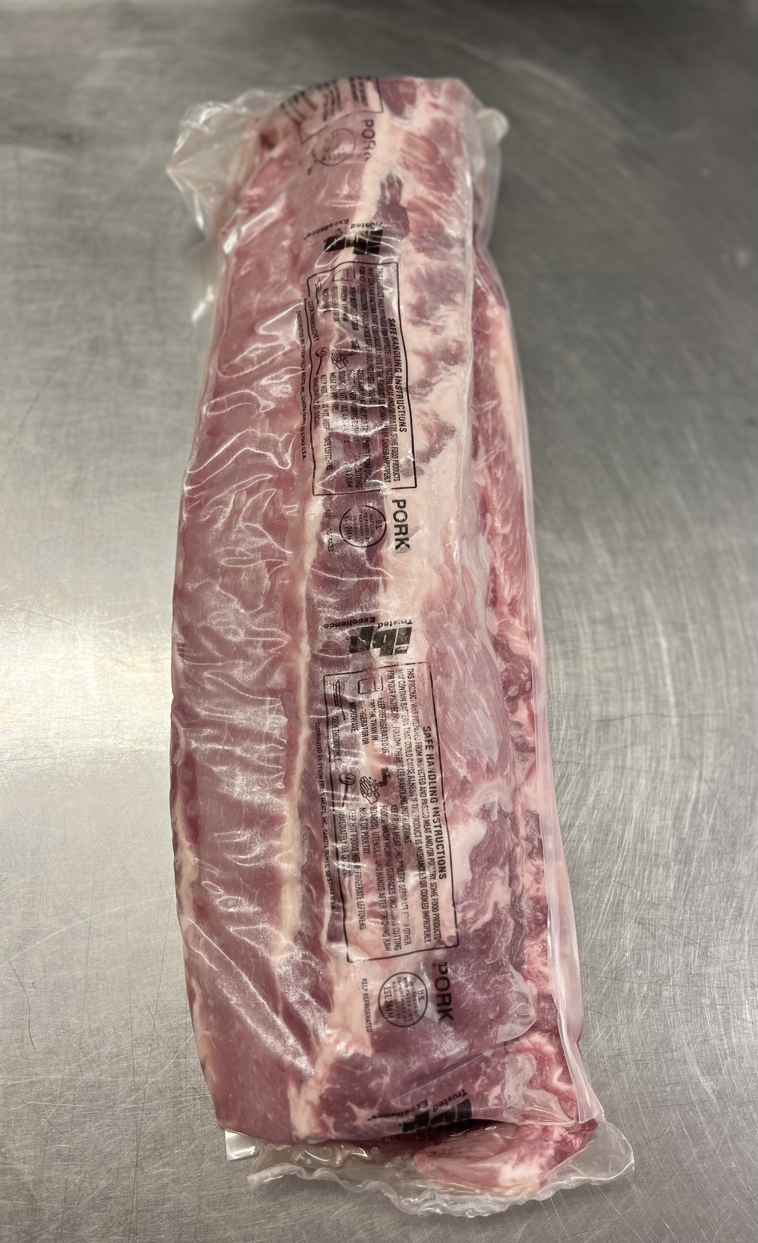 Baby Back Pork Ribs (sold per rack)